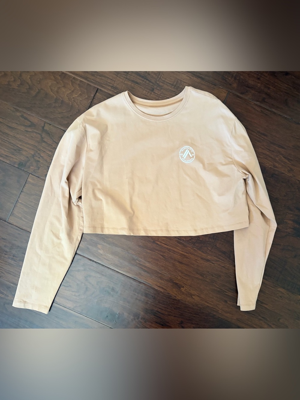 Cropped Long Sleeve Tee with Small Chest Logo - Beige